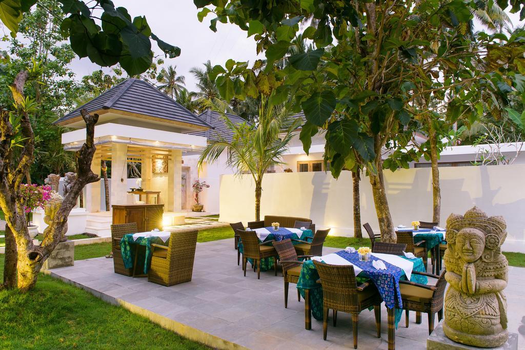 Bali Taman Sari Villas & Restaurant Пулукан Экстерьер фото