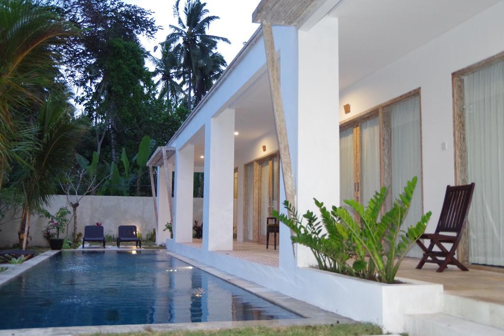 Bali Taman Sari Villas & Restaurant Пулукан Экстерьер фото